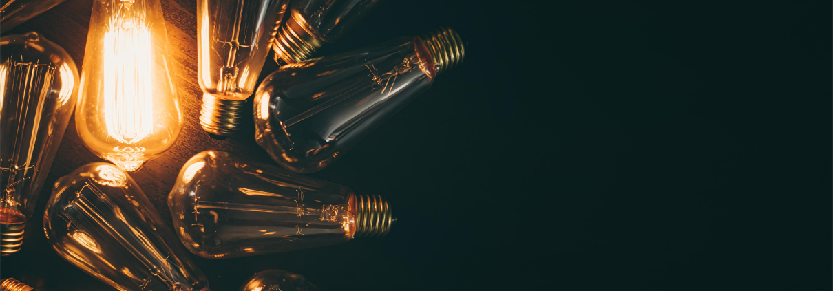 Glowing light bulb symbolizing UPS power supply battery reliability