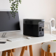 Home setup with different UPS types visible: A desktop UPS unit powering a computer workstation in a modern South African home office
